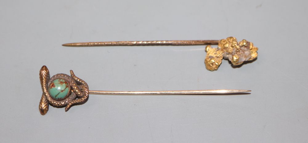 A 14k and turquoise set entwined serpent stick pin, 6cm, gross 2.4 grams and one other nugget stick pin.